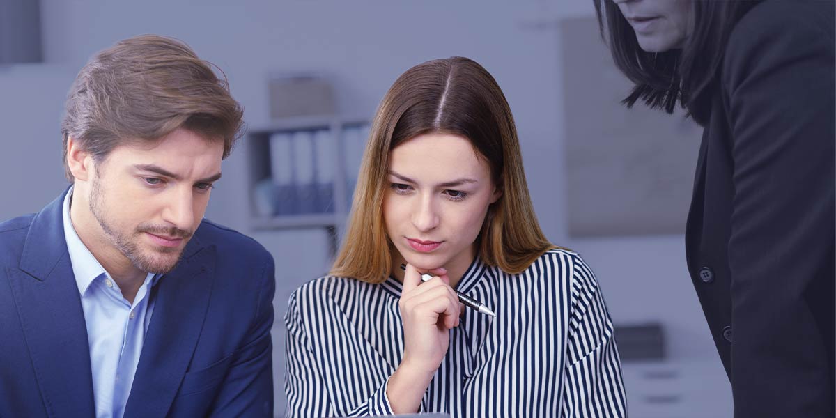 two people reviewing proposal